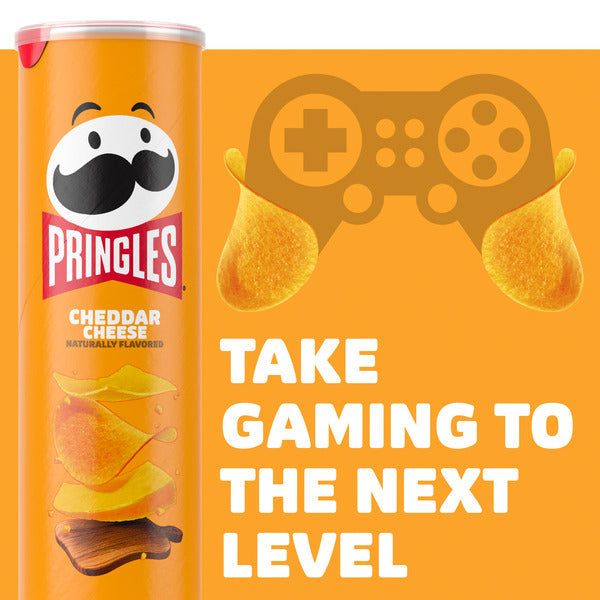 Pringles Cheddar Cheese can with gaming-themed design on an orange background