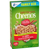 General Mills Apple Cinnamon Family Size Cereal box featuring a green background with a bowl of apple cinnamon toasted oat cereal, sliced apples, and cinnamon sticks.