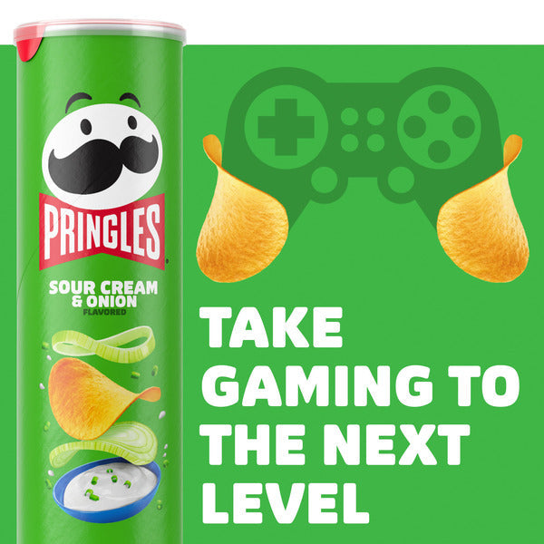 Pringles Sour Cream & Onion potato crisps can beside a green gaming controller graphic with potato chips and the text "Take Gaming to the Next Level" on a green background.