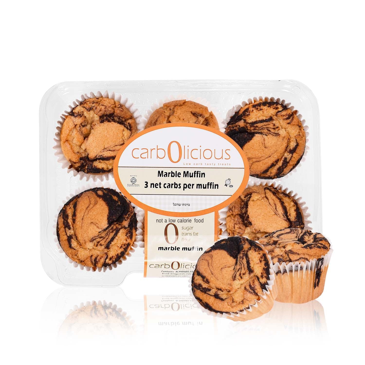 Freshly baked Carbolicious Home-Style Marble Muffins in a 6-pack with rich chocolate swirls, low-carb and sugar-free recipe, labeled with 3g net carbs per muffin in a clear bakery container on a white background.