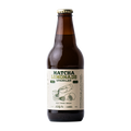 A bottle of Sparkler Matcha Lemonade Sparkler beer in an amber glass bottle with a cream-colored label and a gold crown cap, shown on a solid white background.
