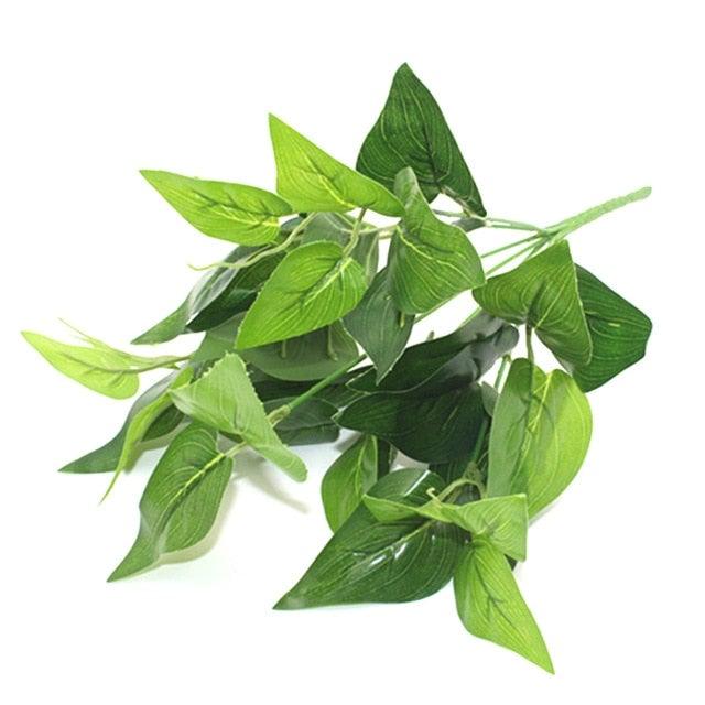 Bunch of green leaves on a white background