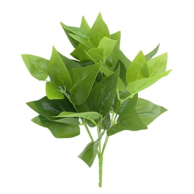 Bunch of green leaves on a white background