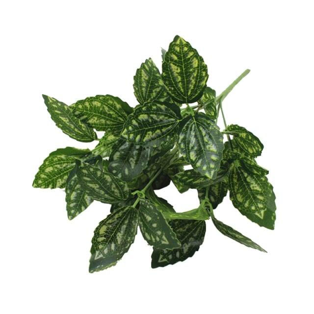 Artificial green leaves with a white background
