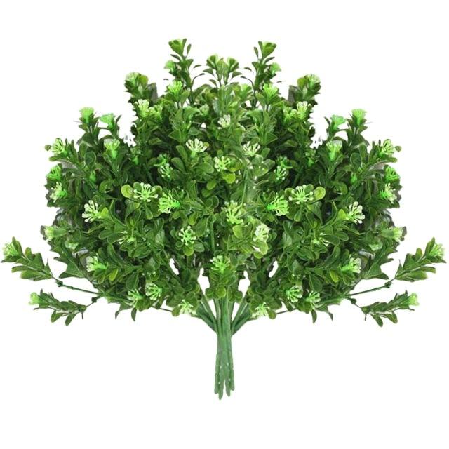 Artificial green bush on a white background