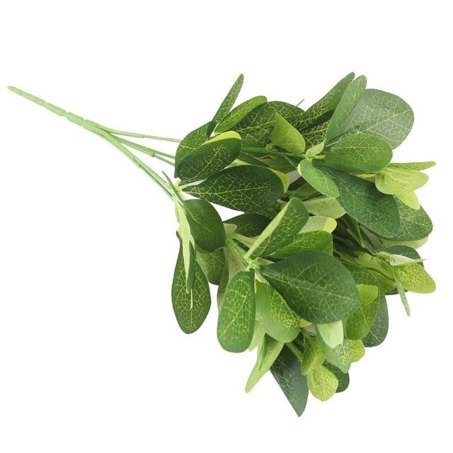 Bouquet of green leaves on a white background