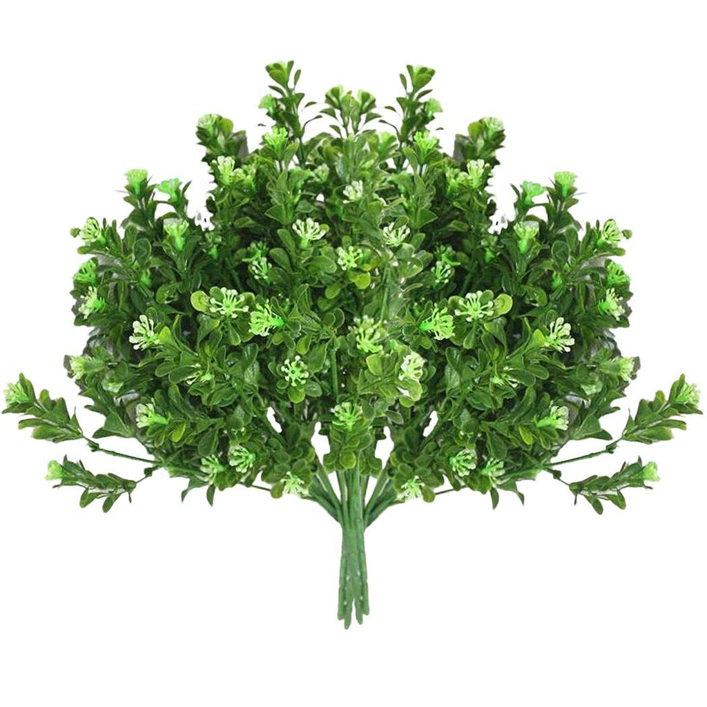 Artificial green bush on a white background