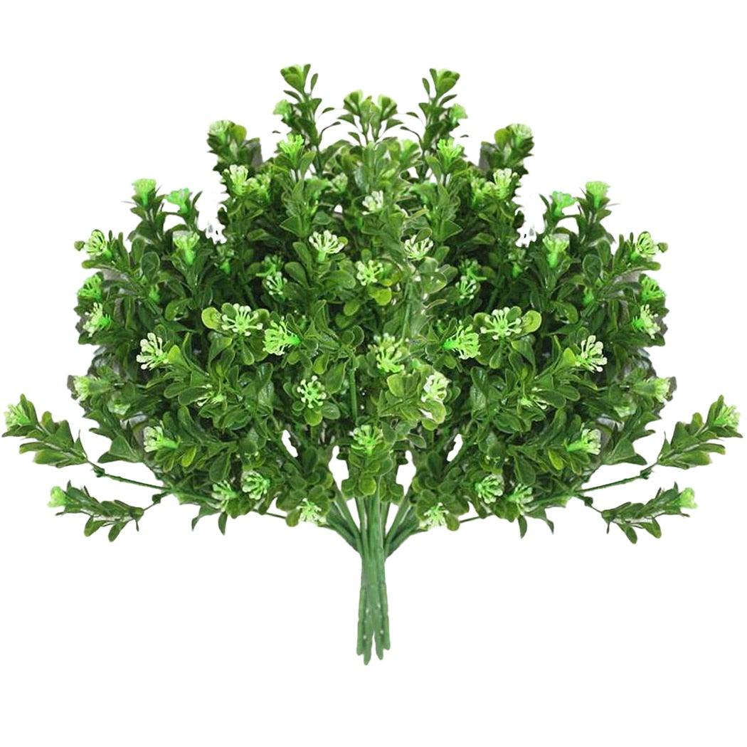 Artificial green bush on a white background