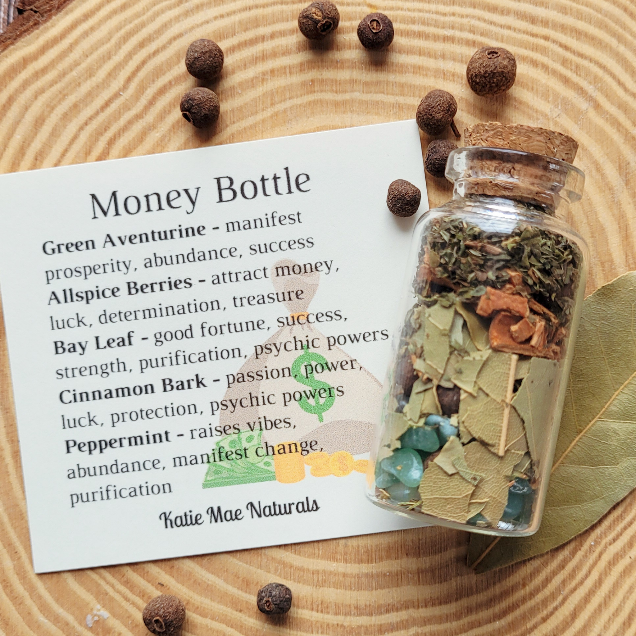 Money Bottle spell jar with green aventurine, allspice berries, bay leaf, cinnamon bark and peppermint for prosperity, abundance, success, luck and manifestation by Katie Mae Naturals.