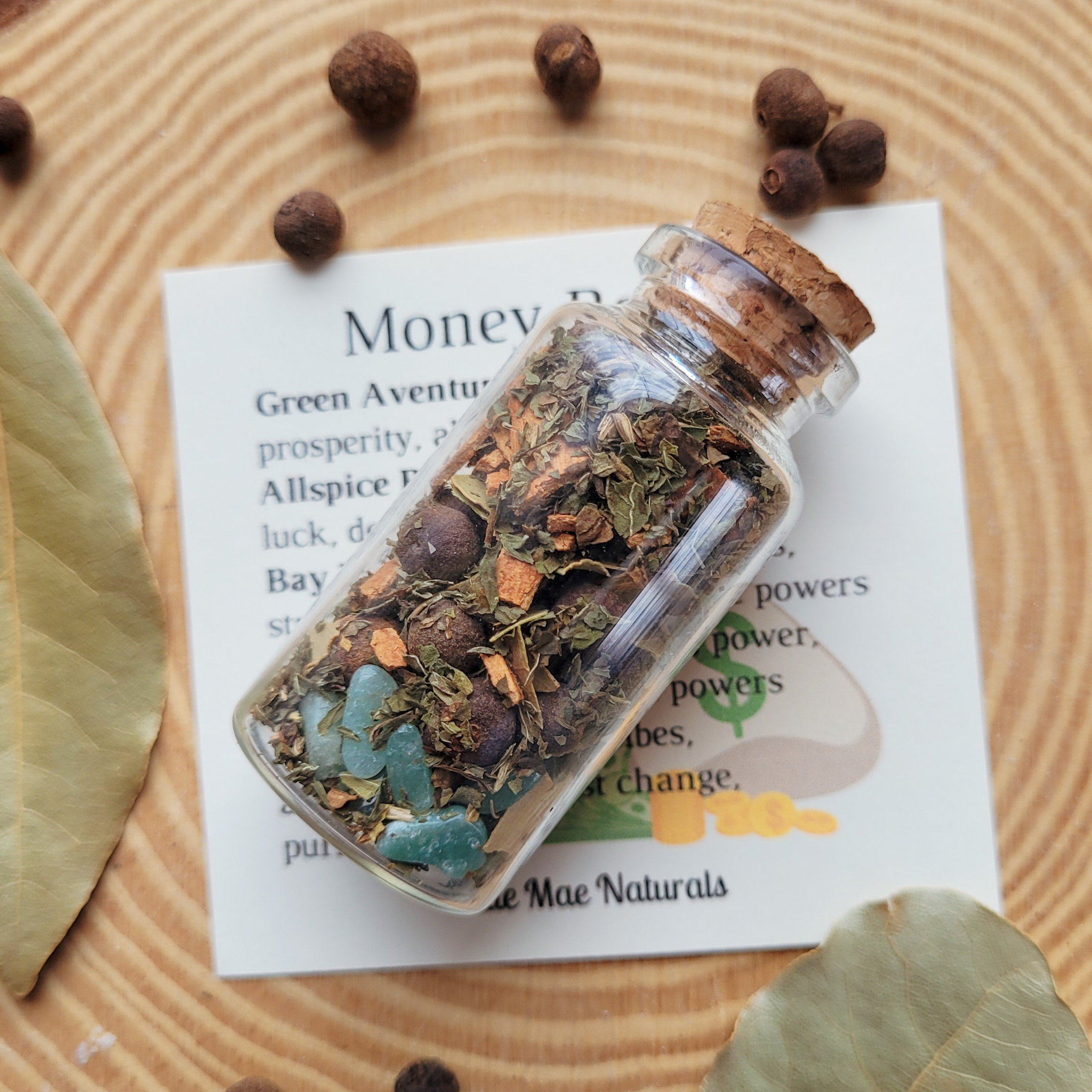 Money spell jar with herbs, crystals and botanicals for prosperity, abundance, luck and wealth manifestation by Katie Mae Naturals