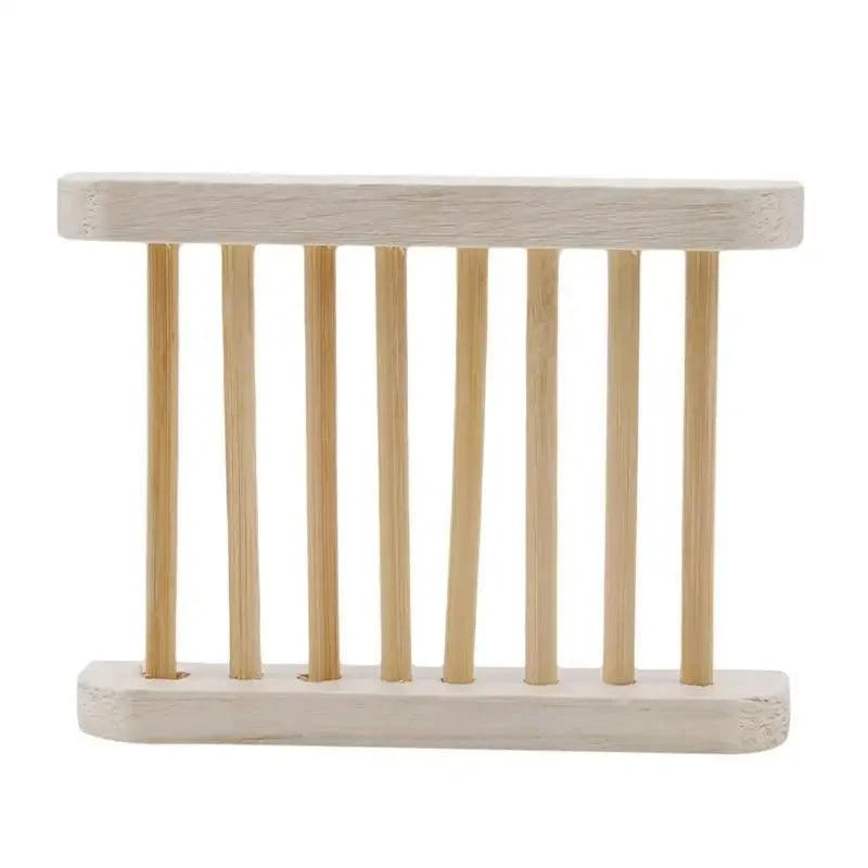 Wooden soap dish with slatted design on a white background