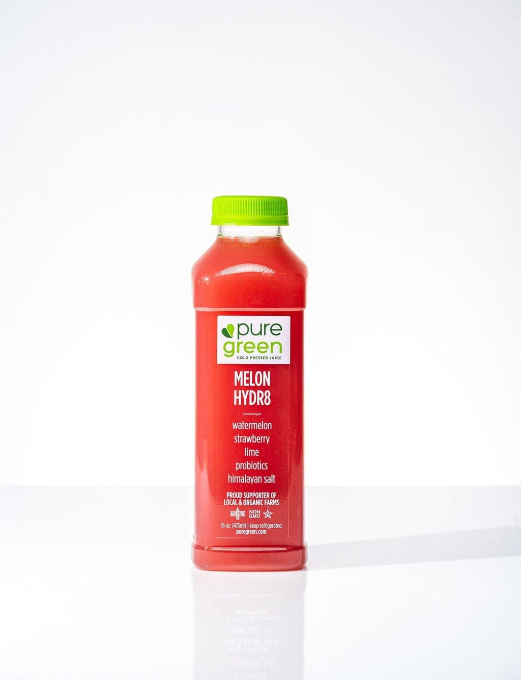 Red bottle of pure green melon hydr8 on a white background. Watermelon, Strawberry, Lime, Probiotics, Himalayan Salt, proud supporters of local and organic farms. The PURE GREEN company cold pressed juice drink.