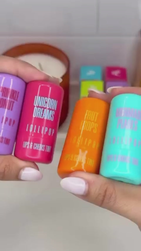 Aminnah Fruit Loops Lollipop Lips & Cheeks Tint in Coral, clean beauty vegan lip and cheek tint with natural ingredients, cruelty free, paraben free, gluten free, recyclable packaging, female owned brand, moisturizing multi-use makeup for a radiant healthy glow.