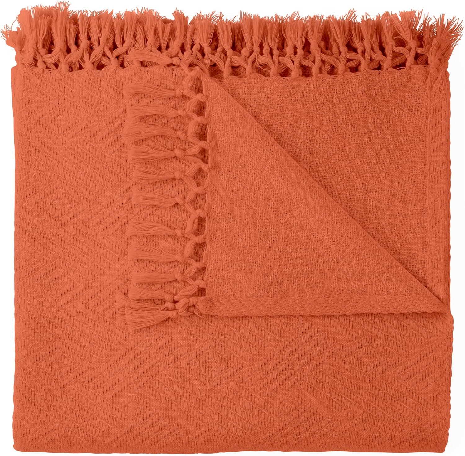 Orange throw blanket with frayed edges on a white background. Diamond Jacquard Throw Rust