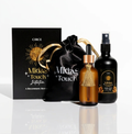 Circe Midas Touch Initiation Ritual abundance self-care gift set with luxury body oil, ritual spray, black satin pouch and manifestation gift box in elegant black and gold packaging.