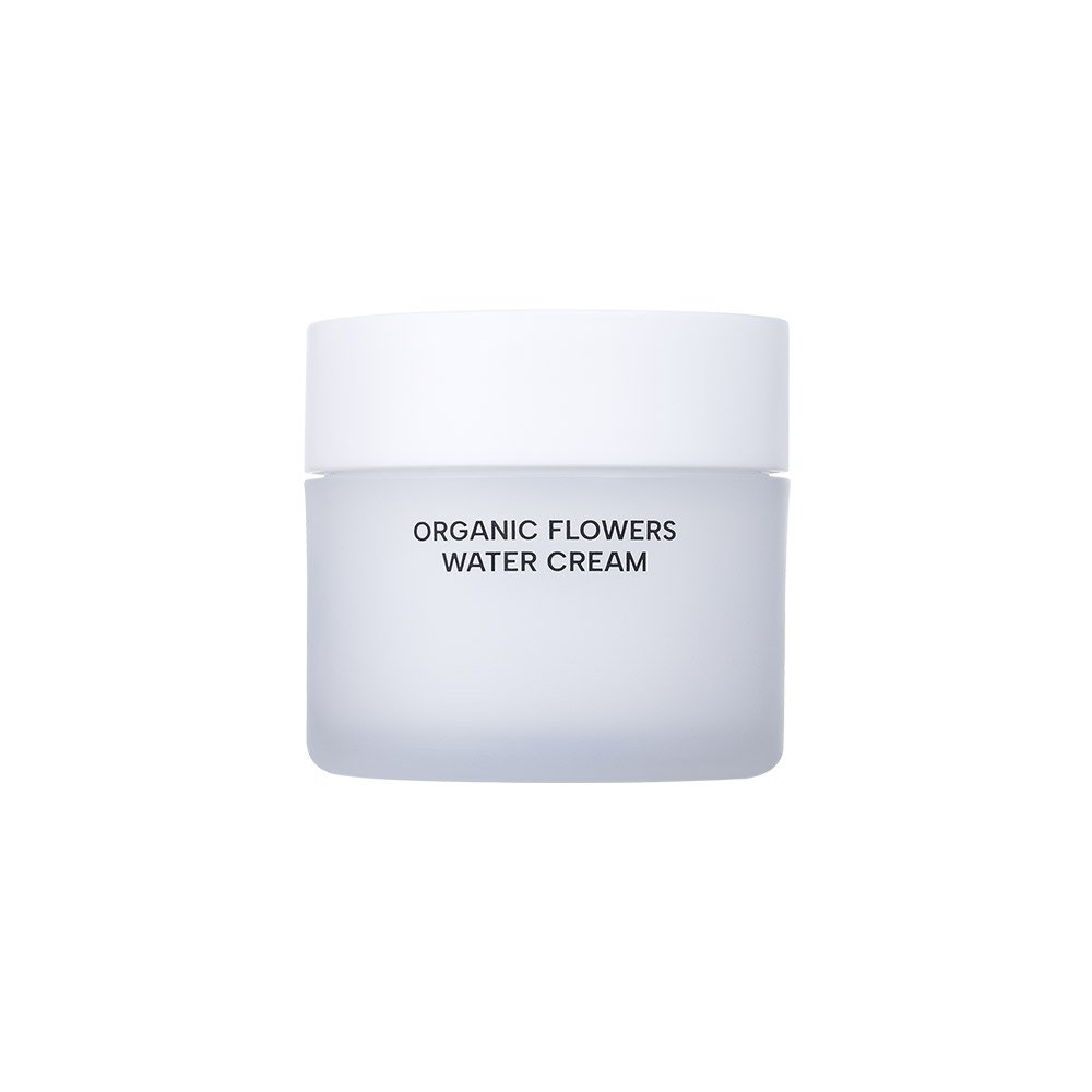 A frosted glass jar of Organic Flowers Water Cream with a white lid, centered on a plain white background.