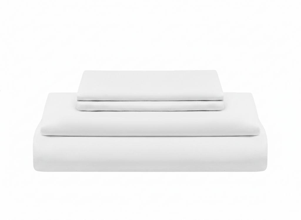 Set of white bed sheets and pillowcases on a white background. Organic Sateen Bed Sheets Set